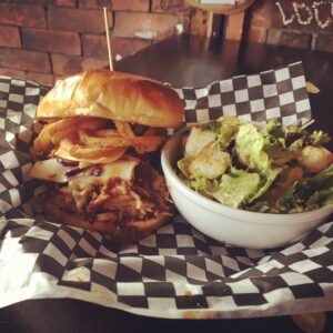 Texas BBQ Burger with house-made toppings and smoky sauce served at Warehouse in Canada.