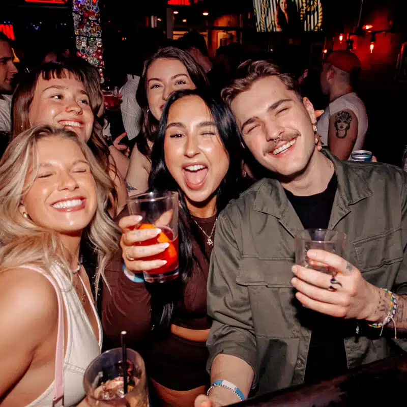 A group of people enjoying and having drinks at Warehouse.
