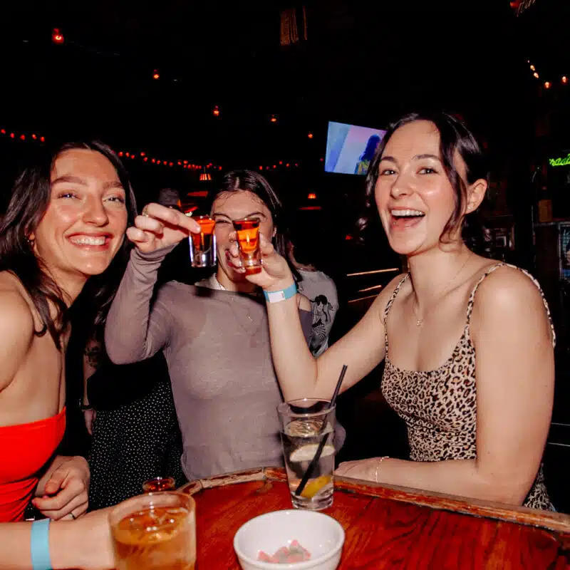 A group of women enjoying the drinks at Warehouse, Toronto.