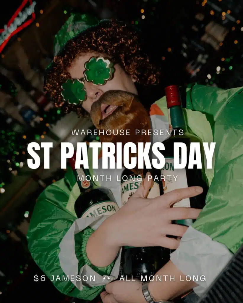 A man dressed in the St. Patrick’s Day theme holding bottles of Jameson at Warehouse.